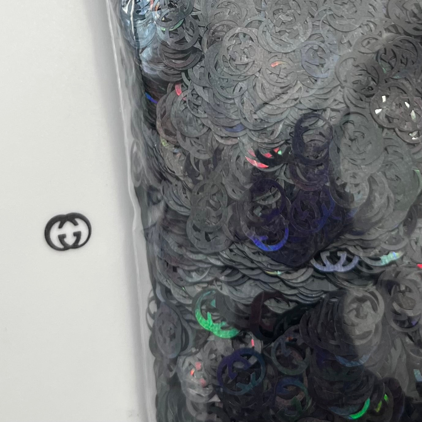 Black Holographic GG